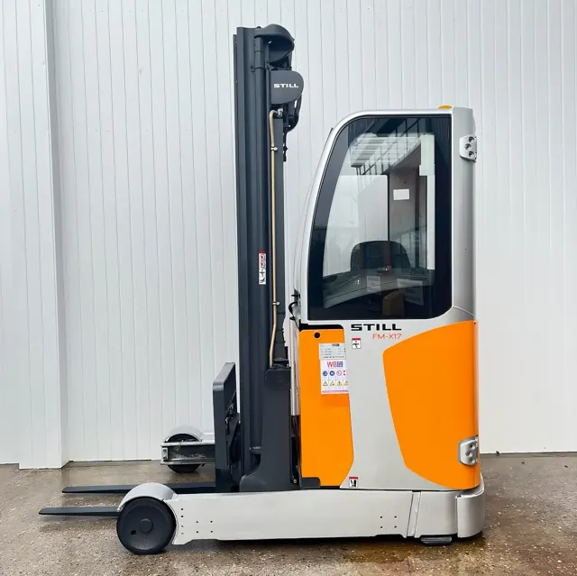 STILL reach truck with an enclosed cold store cab